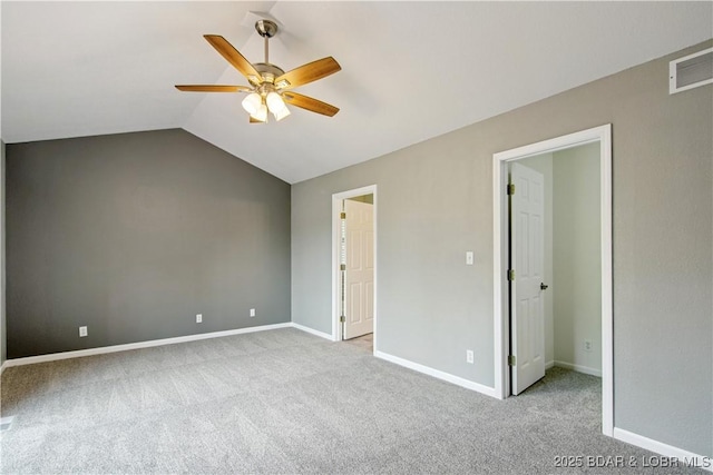1380 Bluff Dr, Osage Beach, MO 65065 - unfurnished bedroom with carpet, vaulted ceiling, baseboards, and ceiling fan