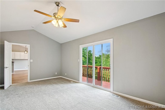 1380 Bluff Dr, Osage Beach, MO 65065 - carpeted empty room featuring lofted ceiling, a ceiling fan, and baseboards