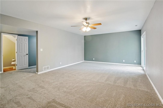 1380 Bluff Dr, Osage Beach, MO 65065 - carpeted empty room featuring ceiling fan and baseboards