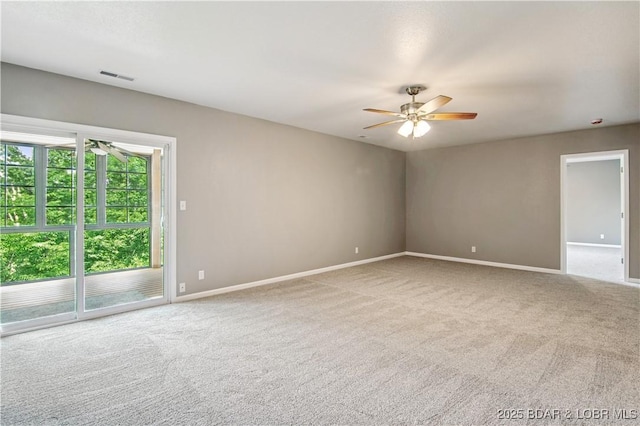 1380 Bluff Dr, Osage Beach, MO 65065 - carpeted empty room featuring a ceiling fan and baseboards