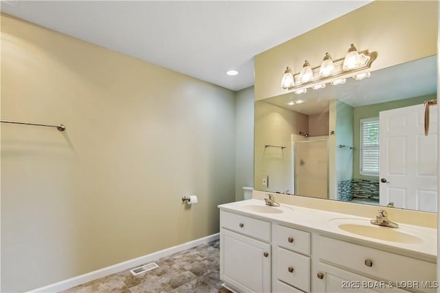1380 Bluff Dr, Osage Beach, MO 65065 - full bathroom featuring baseboards, a walk in shower, and double vanity