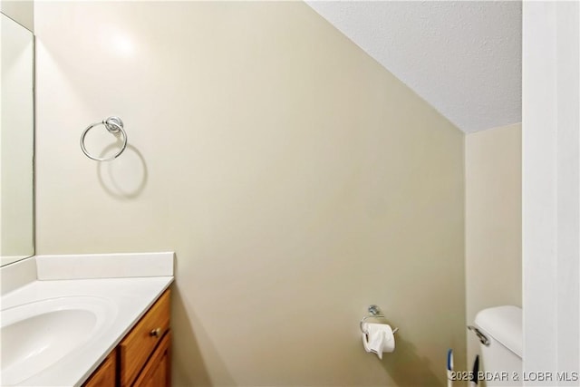 1380 Bluff Dr, Osage Beach, MO 65065 - half bath featuring vanity and toilet
