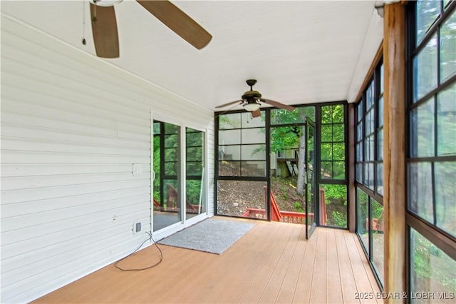 1380 Bluff Dr, Osage Beach, MO 65065 - unfurnished sunroom with ceiling fan