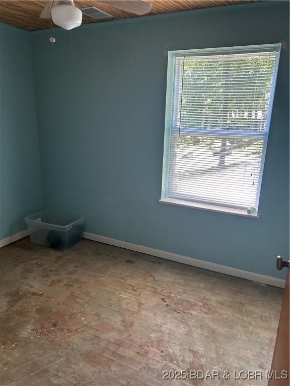 32585 N Ivy Bend Rd, Stover, MO 65078 - unfurnished room featuring baseboards and ceiling fan