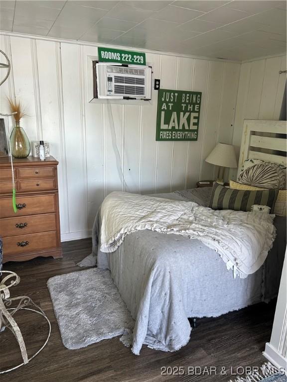 32585 N Ivy Bend Rd, Stover, MO 65078 - bedroom featuring wood finished floors and a wall mounted AC