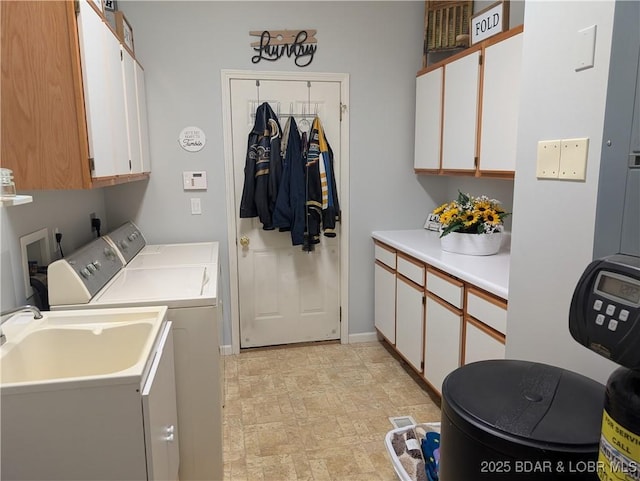 1431 San Jose Dr, Osage Beach, MO 65065 - laundry area featuring cabinet space, independent washer and dryer, and stone finish flooring