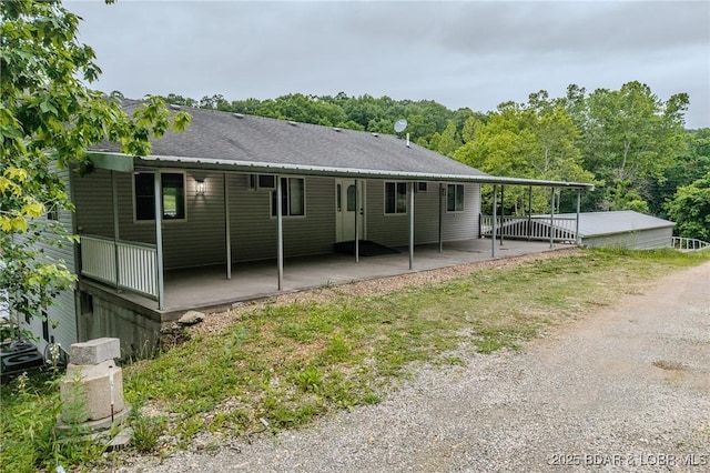 29 Vine St, Edwards, MO 65326 - rear view of house featuring a patio area and a carport