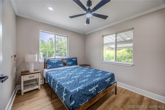 29 Vine St, Edwards, MO 65326 - bedroom with wood finished floors, crown molding, ceiling fan, and recessed lighting