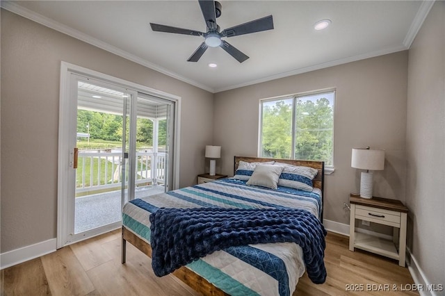 29 Vine St, Edwards, MO 65326 - bedroom featuring access to outside, multiple windows, wood finished floors, ornamental molding, and recessed lighting