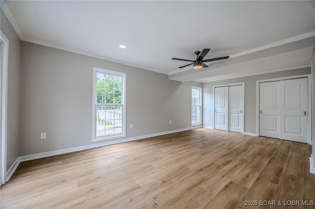 29 Vine St, Edwards, MO 65326 - unfurnished bedroom with multiple closets, light wood finished floors, ornamental molding, ceiling fan, and recessed lighting
