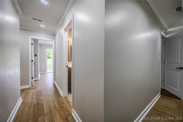 29 Vine St, Edwards, MO 65326 - corridor with crown molding, wood finished floors, and recessed lighting