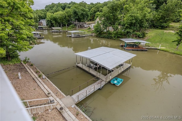 29 Vine St, Edwards, MO 65326 - dock area featuring a water view and a wooded view