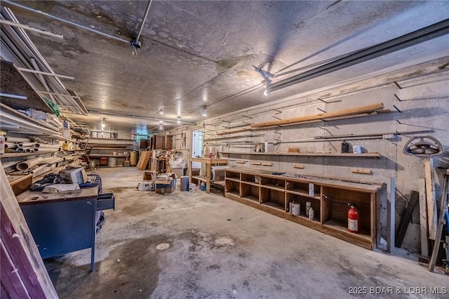 29 Vine St, Edwards, MO 65326 - garage featuring a workshop area