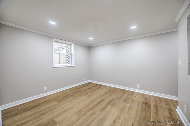 29 Vine St, Edwards, MO 65326 - empty room featuring light wood-style floors, crown molding, and recessed lighting