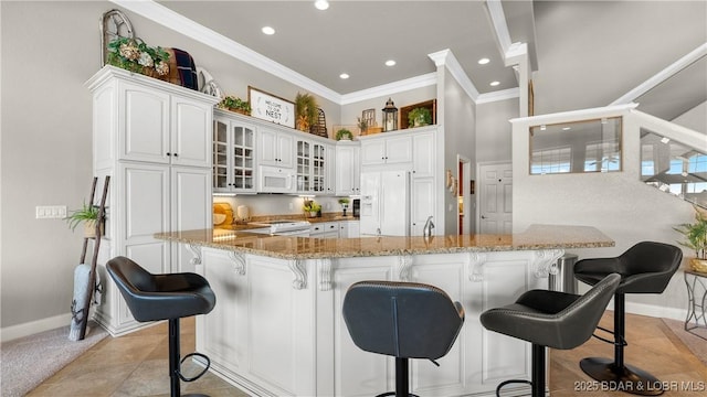15 Pointe Ct, Lake Ozark, MO 65049 - kitchen featuring white appliances, recessed lighting, baseboards, ornamental molding, and glass insert cabinets