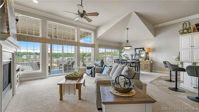 15 Pointe Ct, Lake Ozark, MO 65049 - living room featuring light colored carpet, ceiling fan, baseboards, and crown molding