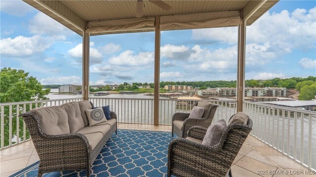 15 Pointe Ct, Lake Ozark, MO 65049 - view of patio / terrace featuring ceiling fan, a water view, and a balcony