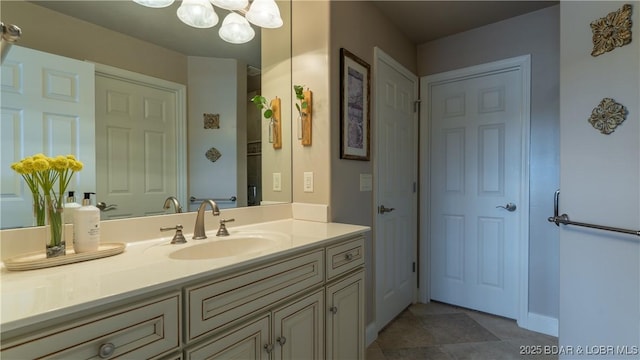 15 Pointe Ct, Lake Ozark, MO 65049 - bathroom featuring vanity, a chandelier, and tile patterned flooring