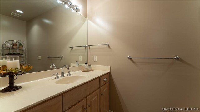 15 Pointe Ct, Lake Ozark, MO 65049 - bathroom featuring vanity