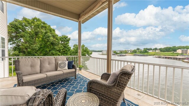 15 Pointe Ct, Lake Ozark, MO 65049 - balcony with a water view and outdoor lounge area