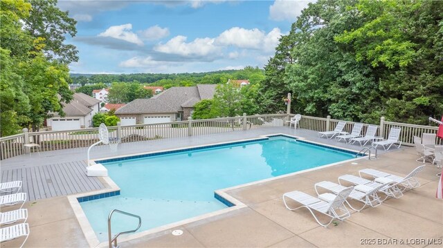 15 Pointe Ct, Lake Ozark, MO 65049 - view of swimming pool with a patio area