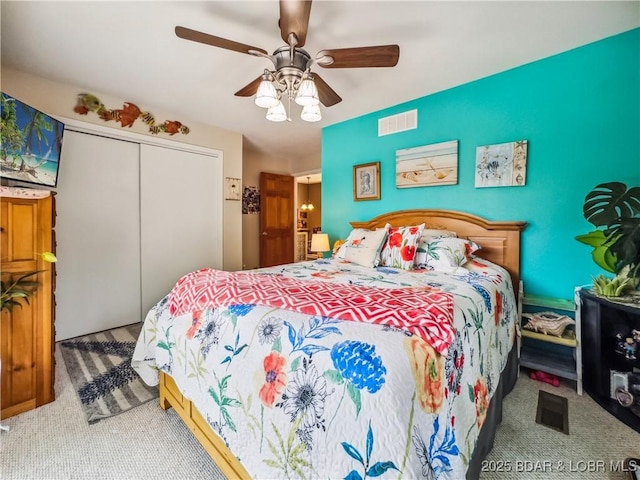 590 Jupiter Rd, Camdenton, MO 65020 - carpeted bedroom with a closet and a ceiling fan
