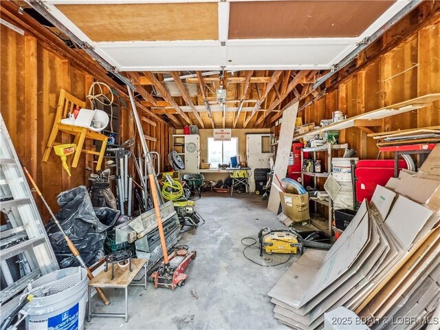 590 Jupiter Rd, Camdenton, MO 65020 - garage with wooden walls