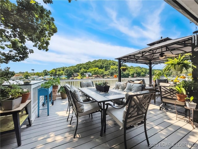 590 Jupiter Rd, Camdenton, MO 65020 - deck with a gazebo, outdoor lounge area, and outdoor dining area