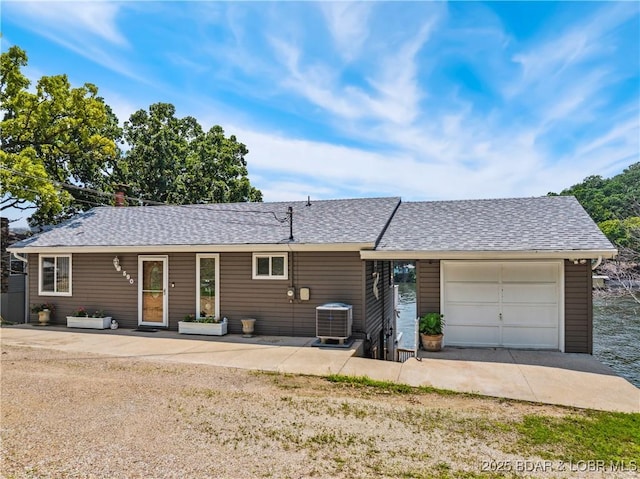 590 Jupiter Rd, Camdenton, MO 65020 - ranch-style house with an attached garage and roof with shingles