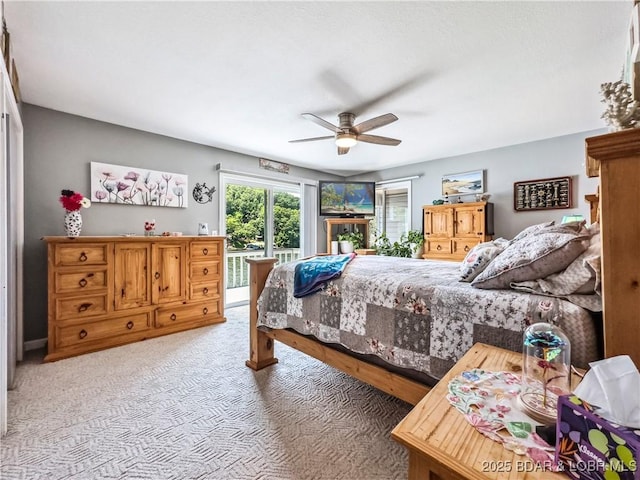 590 Jupiter Rd, Camdenton, MO 65020 - bedroom featuring light colored carpet, ceiling fan, and access to exterior