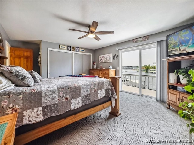 590 Jupiter Rd, Camdenton, MO 65020 - carpeted bedroom with access to outside and a ceiling fan