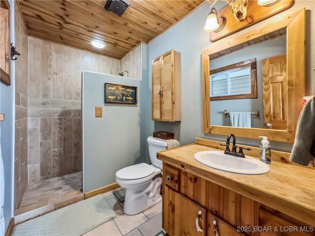590 Jupiter Rd, Camdenton, MO 65020 - bathroom featuring wooden ceiling, a tile shower, vanity, and tile patterned flooring