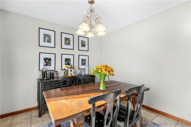 180 Skylark Ln, Linn Creek, MO 65052 - dining space with a chandelier, baseboards, and light tile patterned floors