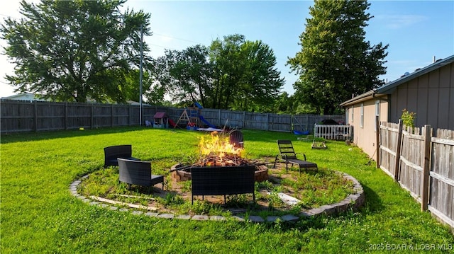 180 Skylark Ln, Linn Creek, MO 65052 - fenced backyard with an outdoor fire pit