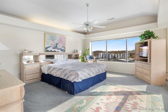106 Falls Pointe Dr Unit 8C, Lake Ozark, MO 65049 - bedroom with light carpet and ceiling fan