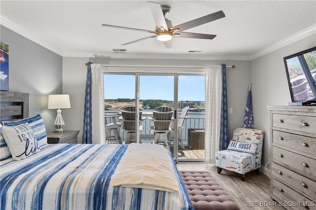4897 Bridgepointe Dr Unit 141, Osage Beach, MO 65065 - bedroom featuring access to outside, wood finished floors, crown molding, and a ceiling fan