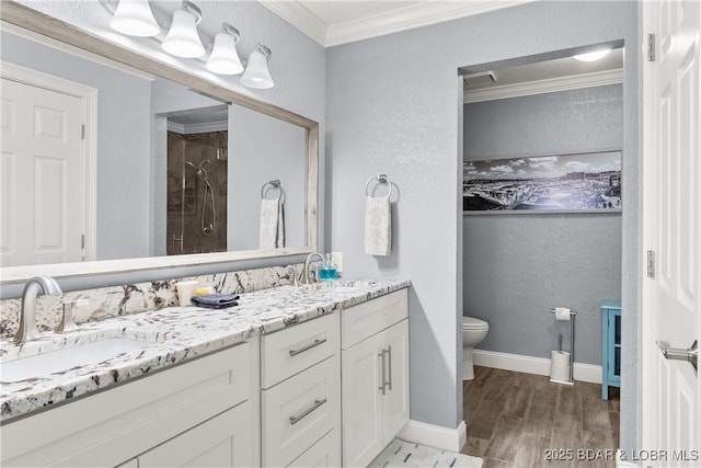 4897 Bridgepointe Dr Unit 141, Osage Beach, MO 65065 - bathroom with double vanity, toilet, tiled shower, ornamental molding, and wood finished floors