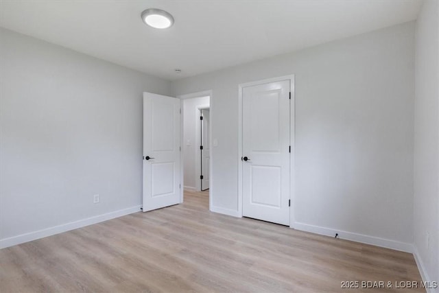 13 Leisure Rd, Eldon, MO 65026 - unfurnished bedroom with light wood-style floors