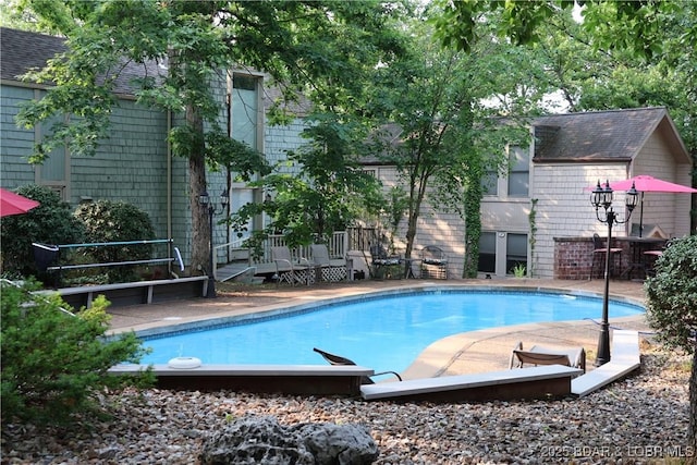 37 Cutter Pl Unit D, Osage Beach, MO 65065 - swimming pool featuring a wooden deck