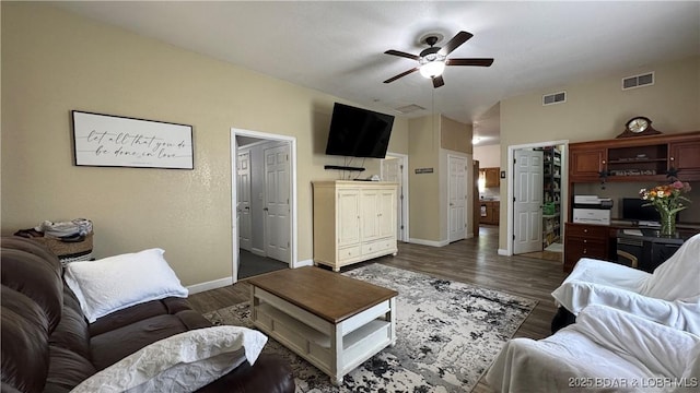 18997 Mystical Ln, Versailles, MO 65084 - living area with a ceiling fan and wood finished floors