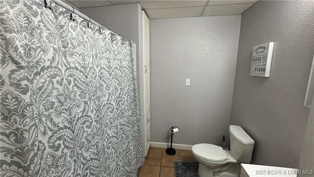 18997 Mystical Ln, Versailles, MO 65084 - full bathroom with tile patterned floors, a paneled ceiling, and curtained shower
