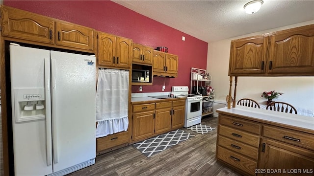 18997 Mystical Ln, Versailles, MO 65084 - kitchen with white appliances, a textured ceiling, dark wood finished floors, brown cabinets, and light countertops