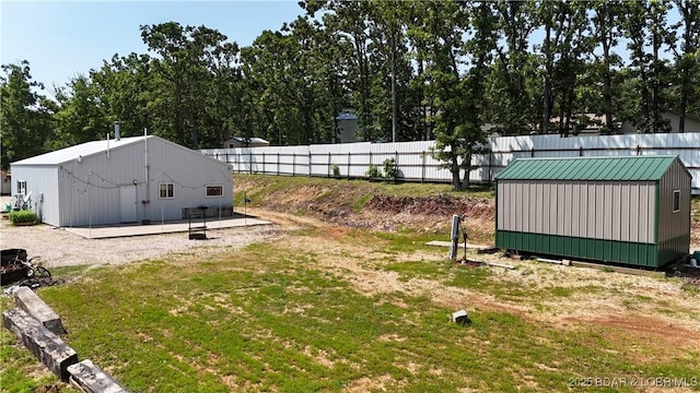 18997 Mystical Ln, Versailles, MO 65084 - view of yard featuring a storage unit