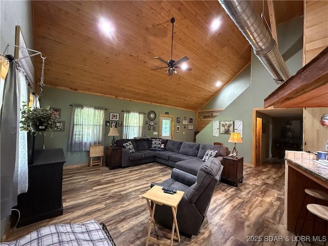 58 Aztec Ln, Eldon, MO 65026 - living area featuring high vaulted ceiling, ceiling fan, wood finished floors, and wooden ceiling