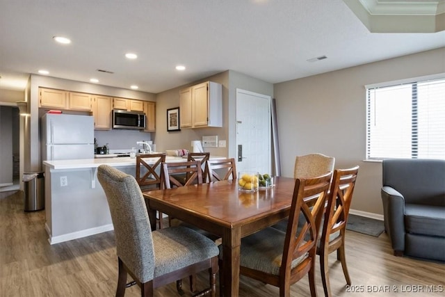 33 Monterey Dr Unit 2A, Lake Ozark, MO 65049 - dining area with wood finished floors and recessed lighting