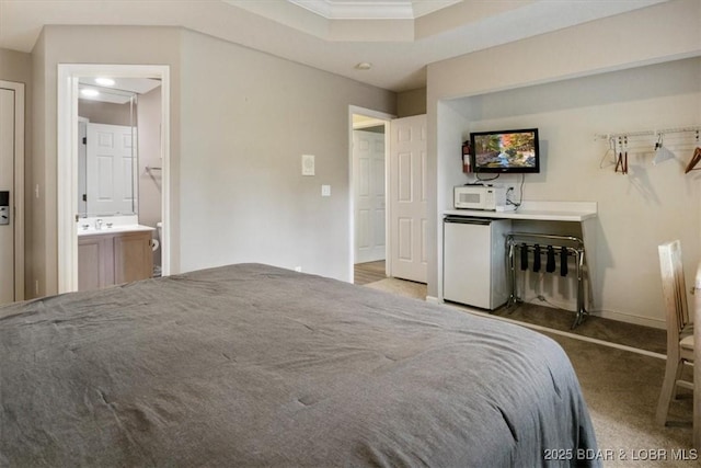 33 Monterey Dr Unit 2A, Lake Ozark, MO 65049 - bedroom featuring fridge, carpet floors, ornamental molding, and ensuite bathroom
