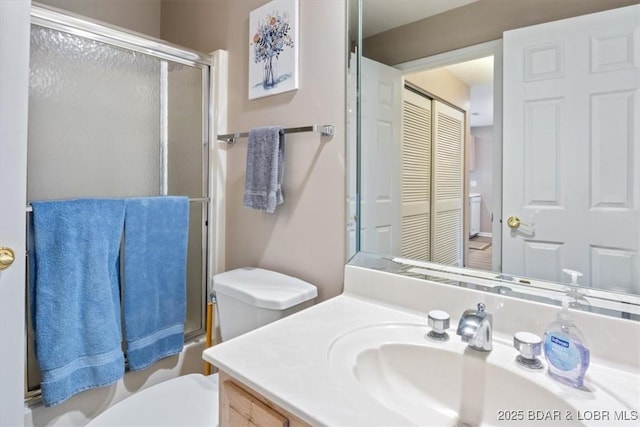 33 Monterey Dr Unit 2A, Lake Ozark, MO 65049 - bathroom featuring toilet and vanity