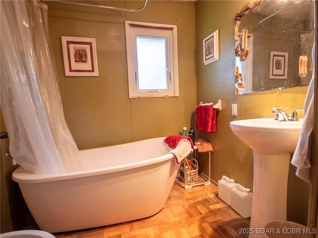 32056 Gentry Ln, Gravois Mills, MO 65037 - full bathroom featuring a freestanding tub