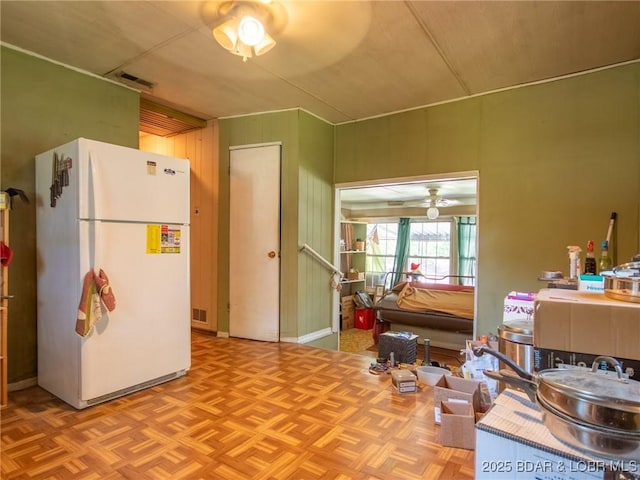 32056 Gentry Ln, Gravois Mills, MO 65037 - kitchen with freestanding refrigerator and ceiling fan