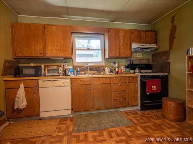 32056 Gentry Ln, Gravois Mills, MO 65037 - kitchen with black appliances, under cabinet range hood, brown cabinetry, and light countertops